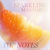 An artistic image featuring a slice of orange with a soft, radiant background; the text reads "Sparkling Mandarin" and "Top Notes."