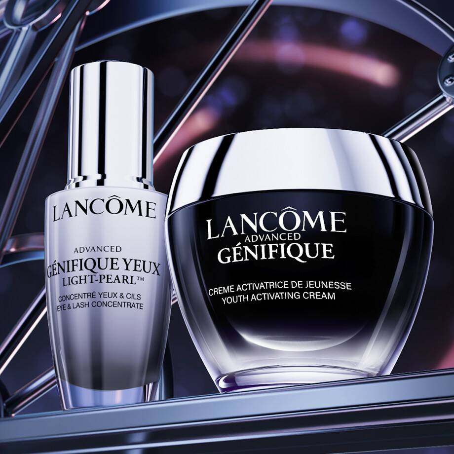 Lancome's Advanced Genfique Creme and Genifique Yeux Light-Pearl Serum displayed together on a neutral background.