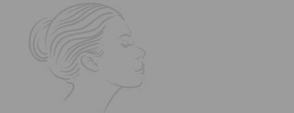 Outline illustration of a woman's profile on a light gray background.
