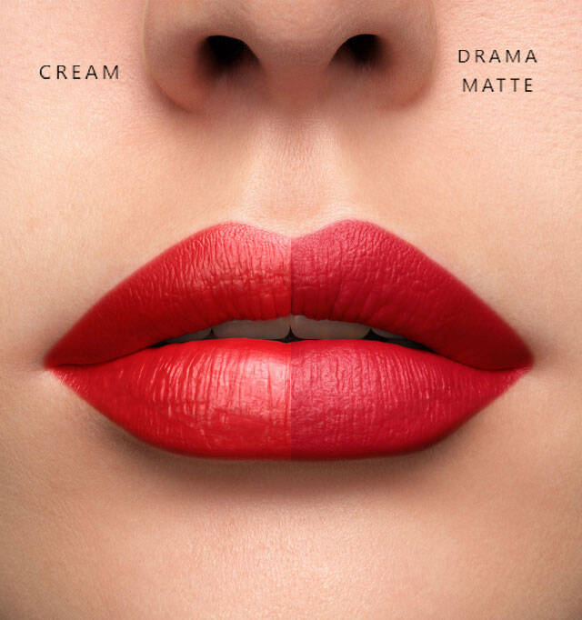 A close-up of a pair of lips, half coated in a creamy red lipstick and the other half in a matte red lipstick, showcasing a contrast between the two textures.