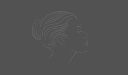 Outline of a woman's profile against a light blue background. The woman has a bun hairstyle and her eyes are closed, conveying a serene expression.